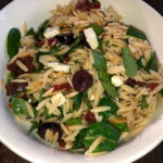 Spinach and orzo salad with kalamata olives and feta cheese